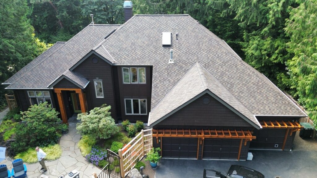 CertainTeed Presidential Autumn Blend shingle roof with new brown gutters on a Bainbridge Island home