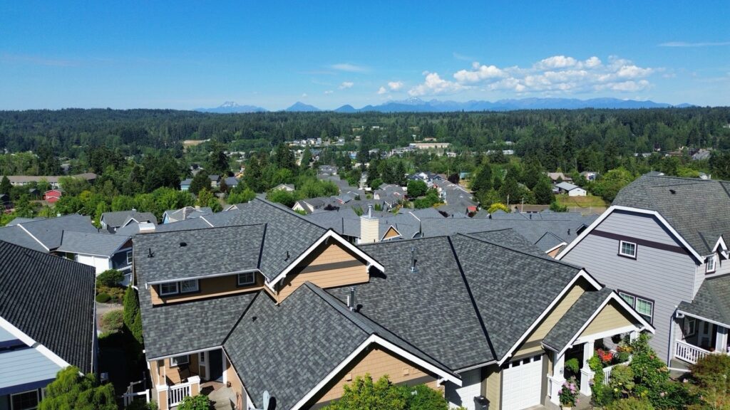 Owens Corning Duration Estate Gray roof replacement on a Poulsbo, WA home with Olympic Mountain views